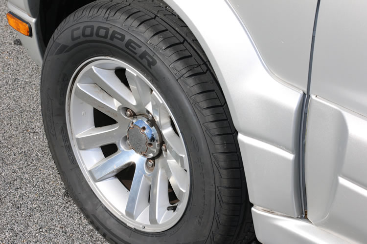 Cooper Tires review - all-season tires mounted on vehicle ready for road trip adventures and daily driving