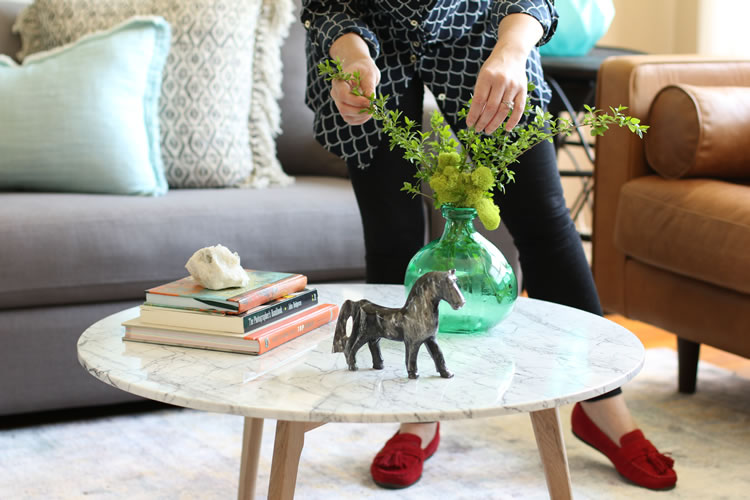 Styling the Mara marble coffee table from Article with fresh flowers