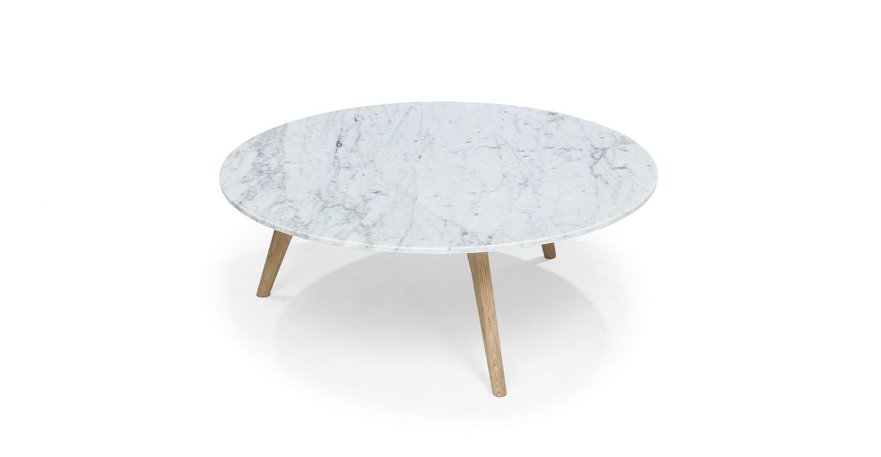 Mara coffee table from Article with white marble top and oak legs