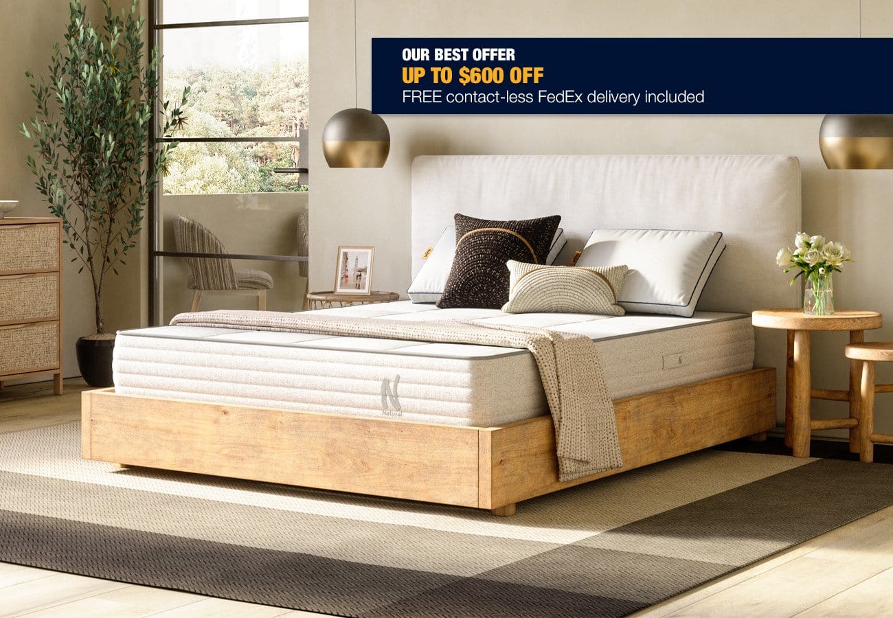 Person sleeping comfortably on Nolah Natural organic mattress in peaceful bedroom