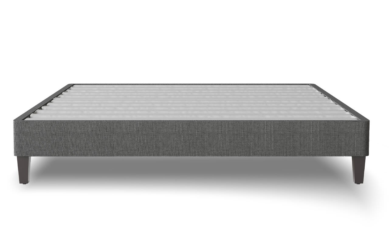 Nolah Natural mattress on modern wooden platform bed frame in bedroom setting