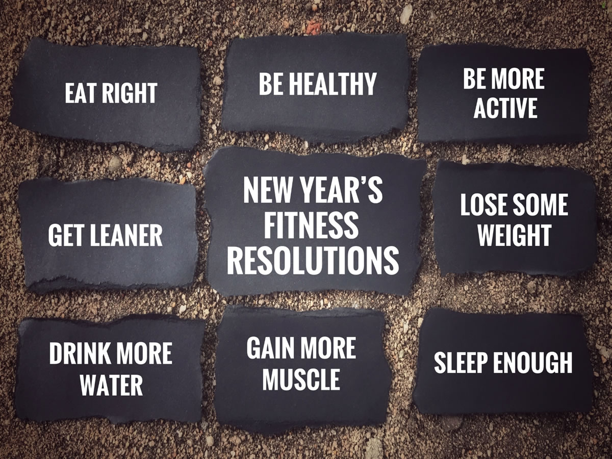Fitness goals written on paper showing planning to achieve your fitness goals